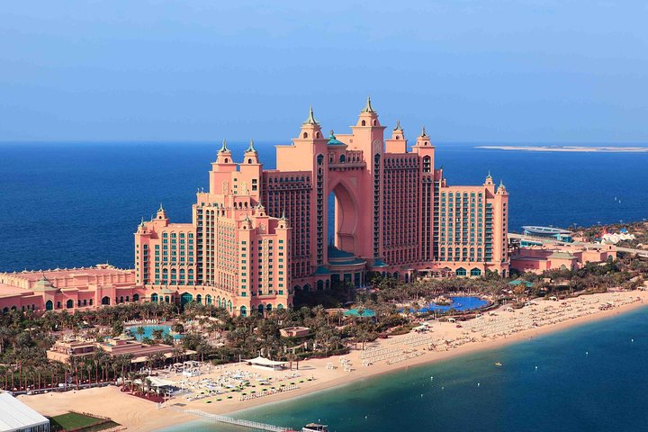 Experience the stunning beauty of Atlantis The Palm where luxurious architecture meets the serene sea perfect for unforgettable memories and picturesque moments during your Dubai adventure.